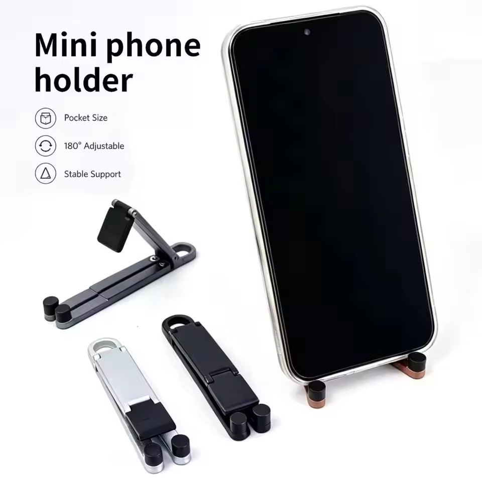 折りたたみ式キーチェーン型スマホスタンド 多角度調整可能 軽 - Taco Stand Holder のレビューと価格